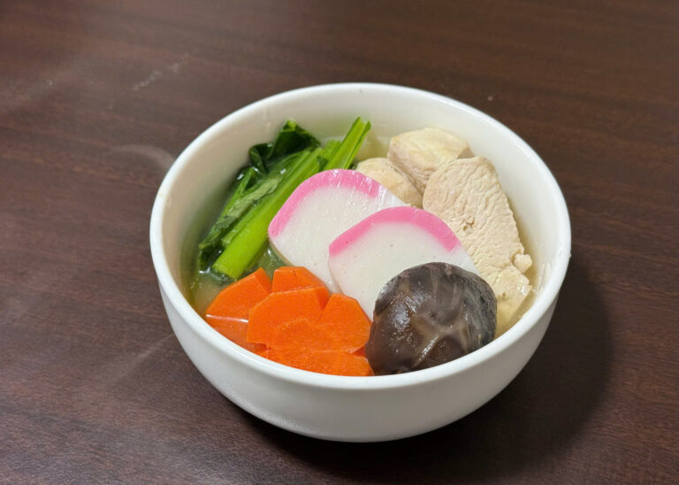 Homemade Ozoni soup with mochi, chicken, and vegetables